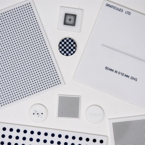 White Glass Reticles, Resolution Charts, Scales, Dot Arrays and Chequerboards
