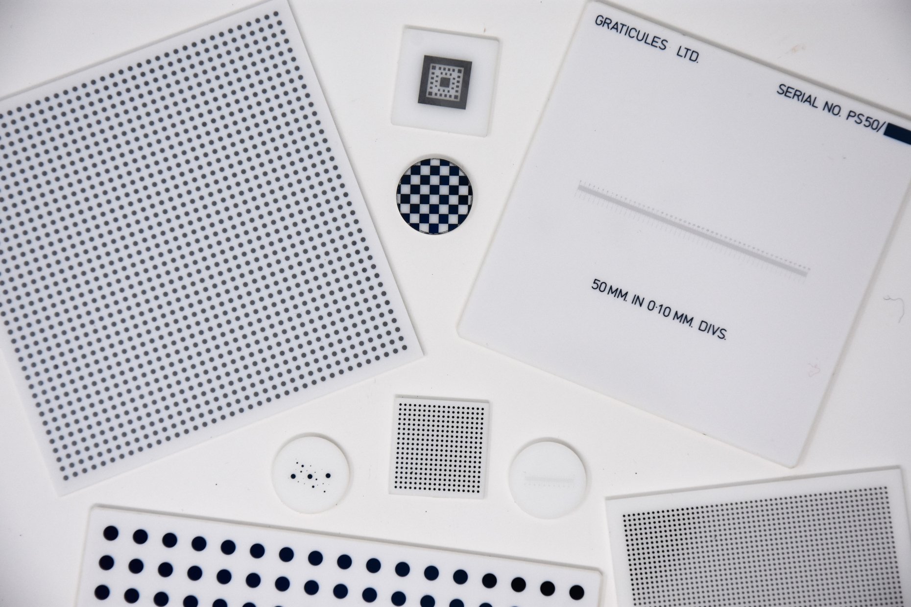 White Glass Reticles, Resolution Charts, Scales, Dot Arrays and Chequerboards